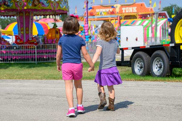 kids at the carnival at Alvin frontier Day